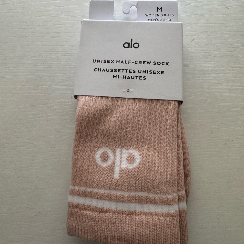 ALO Yoga Unisex Half-Crew Socks in Blush Pink with White Stripe